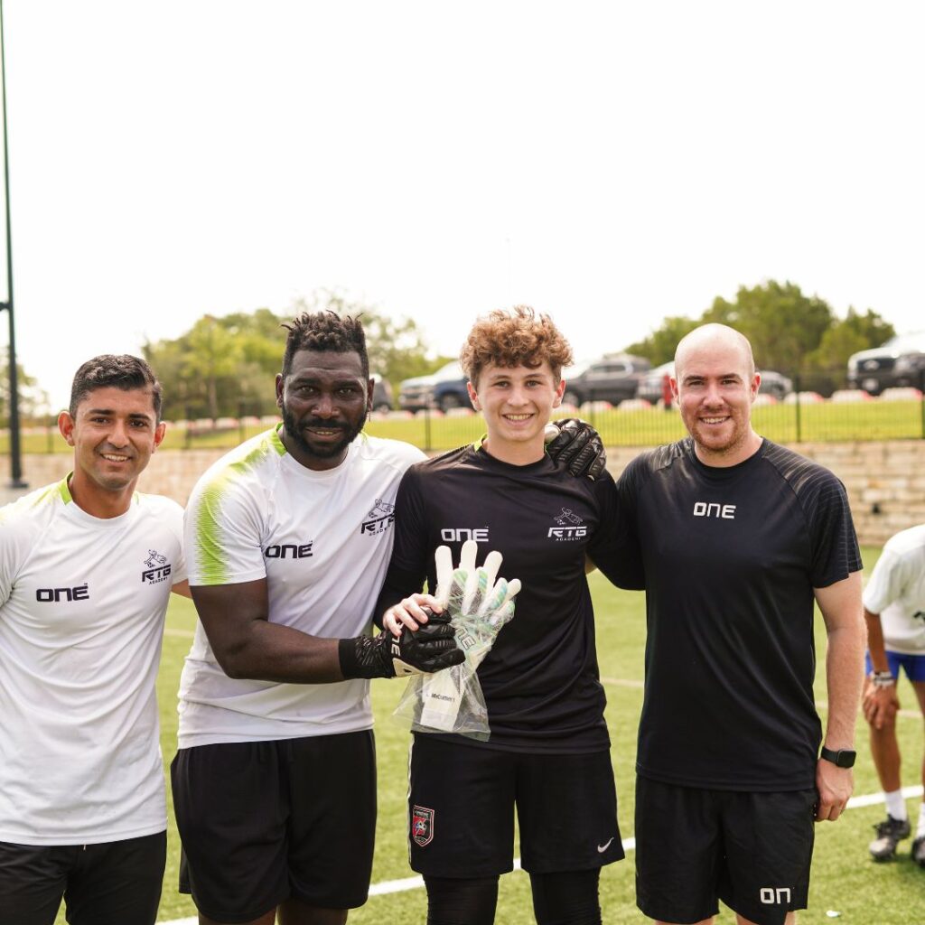 Ryan standing with in a line with players 