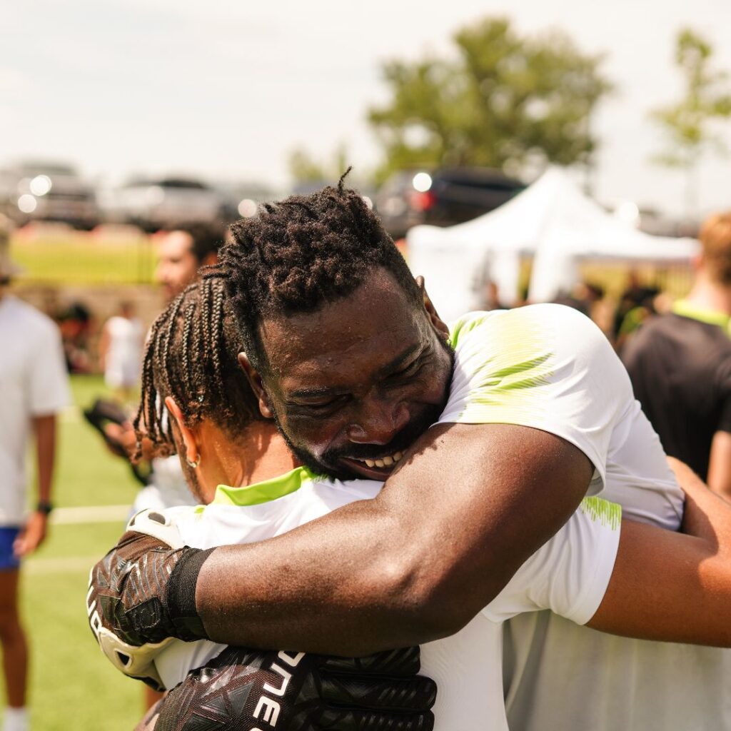 Ryan hugging one of his players
