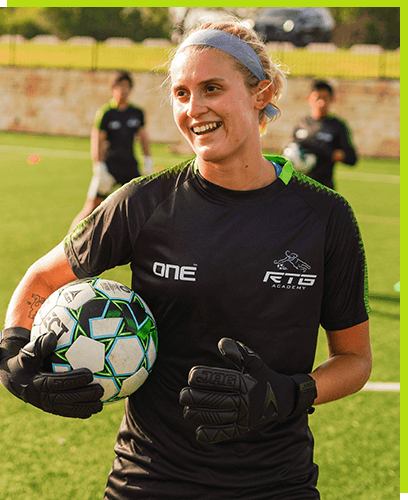 mature young goalkeeper happily enjoying camp